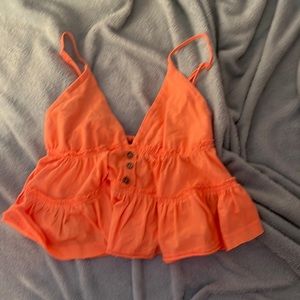 Angie coral ruffle tank top
